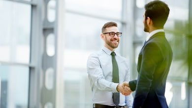 Two businessmen shaking hands