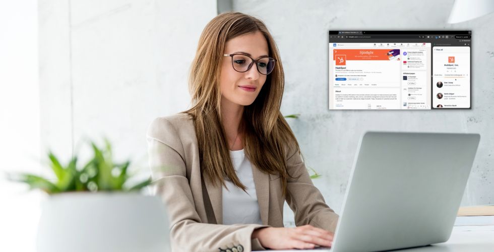 A woman on her laptop using Introhive's Browser Extension while conducting research on LinkedIn as part of client prospecting.