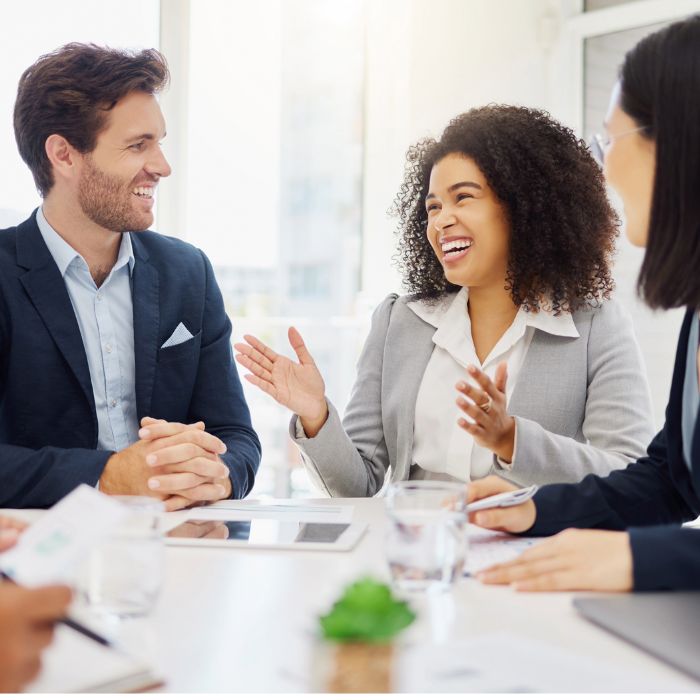 Business team discusses merger and acquisition strategies during a collaborative meeting.