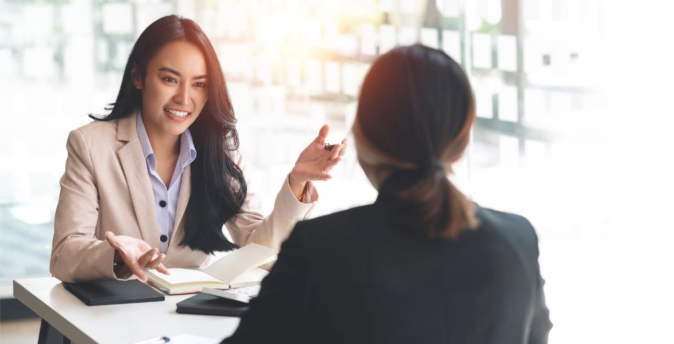 Professional advisor in a meeting with a key stakeholder — the result of a warm introduction that opens doors to key account growth.