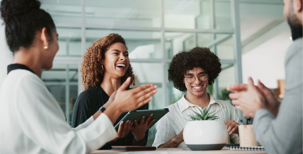 Professional services team discussing CRM best practices as one of their INBOUND 2025 takeaways from this year’s event.