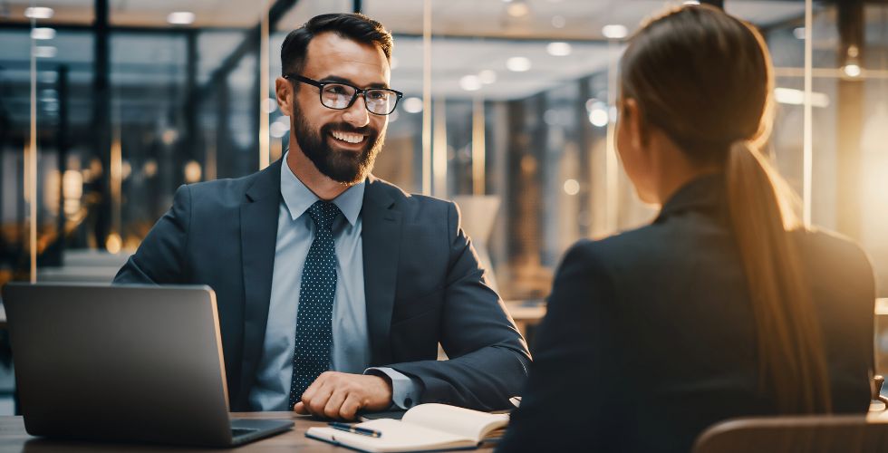 Legal client relationship management software used by a law firm professional to review client information and relationship history during a prep meeting.